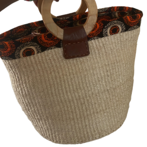 Size 10 sisal kiondo with fabric lining and binding, zip, and wooden handles